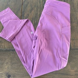 Lululemon tights excellent condition with reflective accent on legs